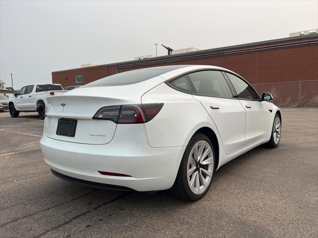 used 2022 Tesla Model 3 car, priced at $27,320