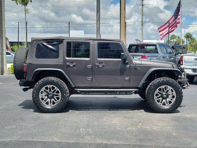 used 2014 Jeep Wrangler Unlimited car, priced at $21,589
