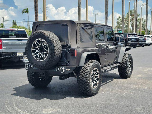 used 2014 Jeep Wrangler Unlimited car, priced at $21,589