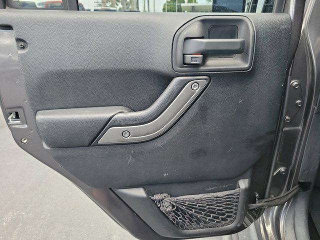 used 2014 Jeep Wrangler Unlimited car, priced at $21,589