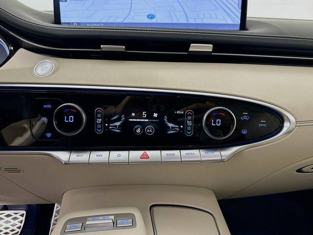 used 2025 Genesis GV70 car, priced at $57,881