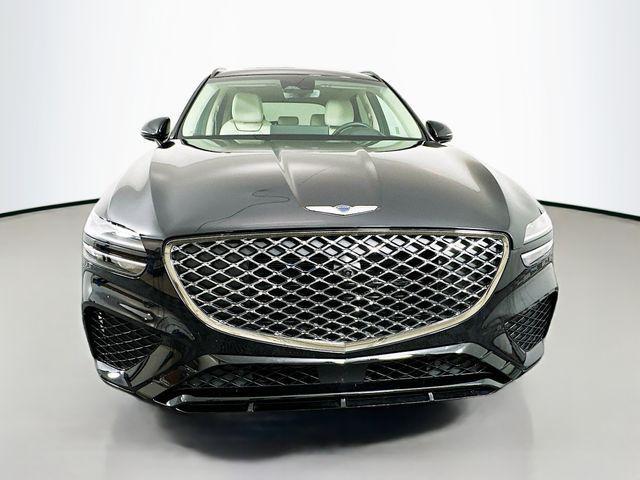 used 2025 Genesis GV70 car, priced at $56,889