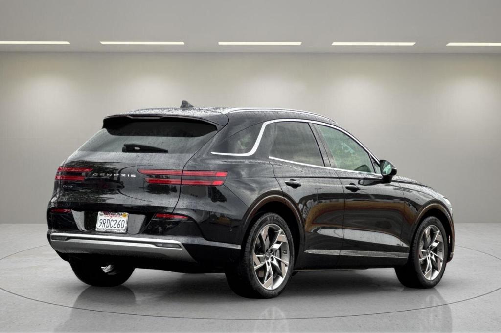 used 2025 Genesis Electrified GV70 car, priced at $52,991