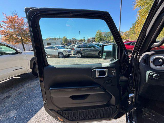 used 2025 Jeep Wrangler car, priced at $38,760