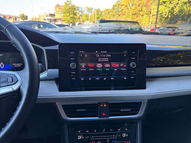 used 2025 Volkswagen Taos car, priced at $24,988