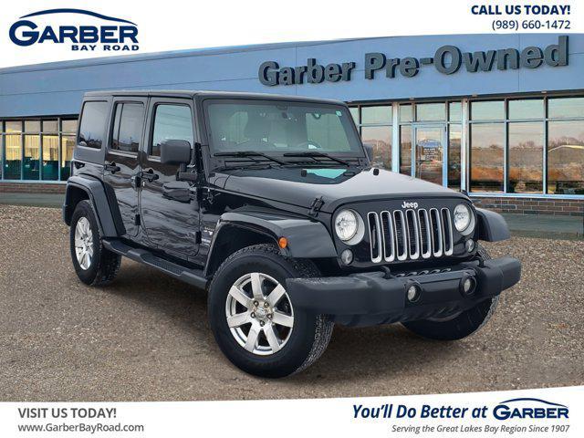 used 2016 Jeep Wrangler Unlimited car, priced at $19,759