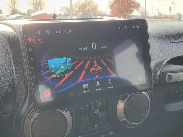 used 2014 Jeep Wrangler Unlimited car, priced at $19,987