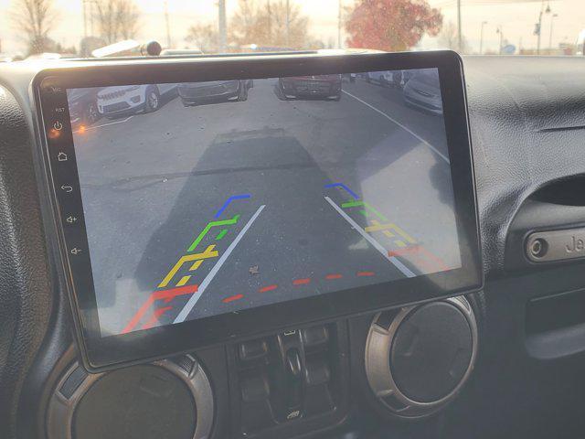 used 2014 Jeep Wrangler Unlimited car, priced at $19,987