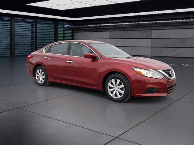 used 2016 Nissan Altima car, priced at $9,999