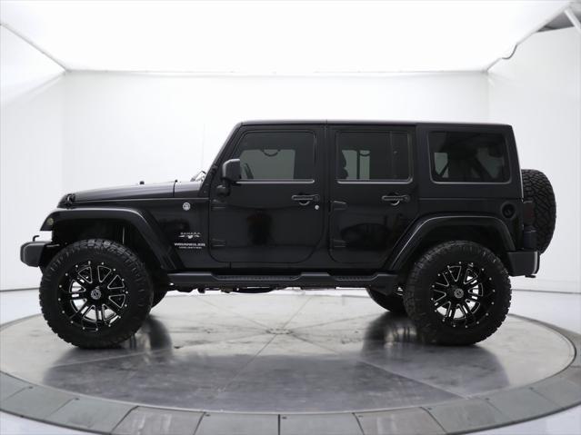 used 2016 Jeep Wrangler Unlimited car, priced at $23,032