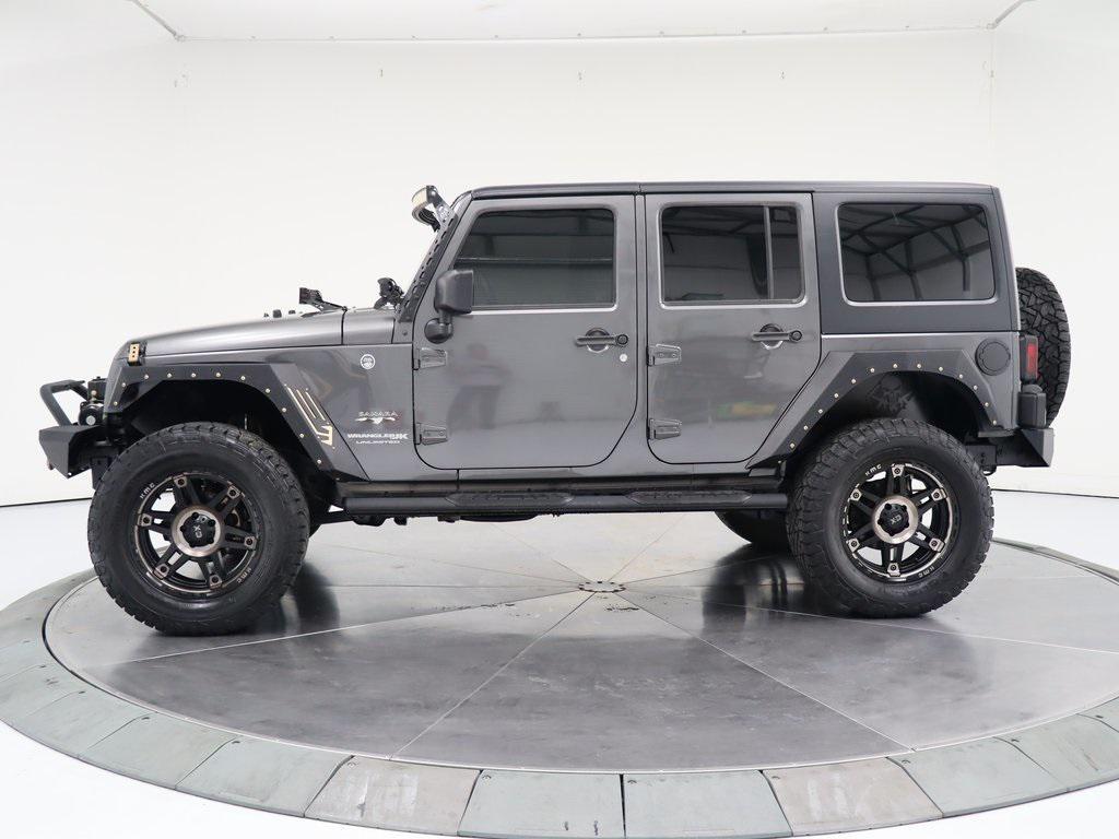 used 2018 Jeep Wrangler JK Unlimited car, priced at $23,998