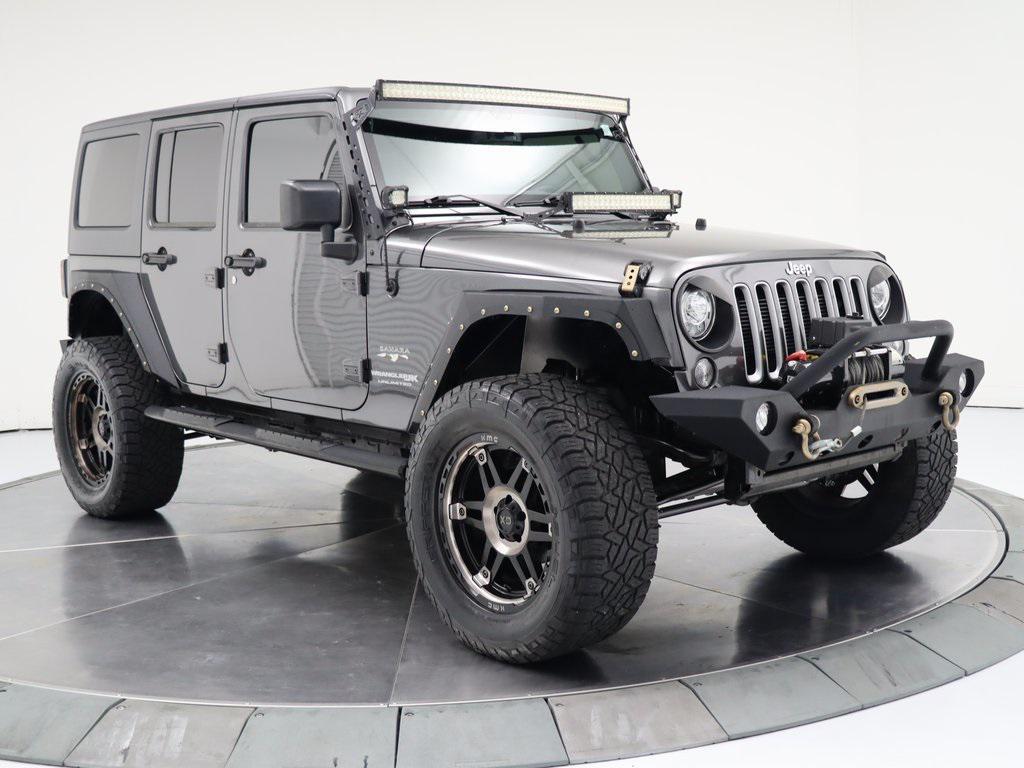 used 2018 Jeep Wrangler JK Unlimited car, priced at $23,998