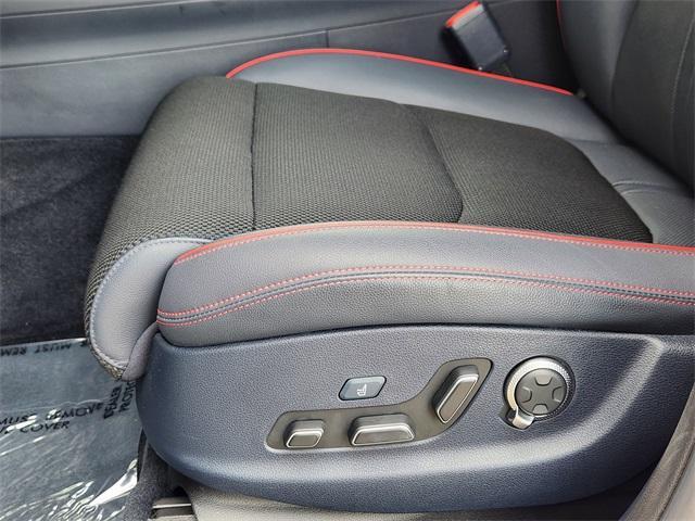 used 2024 Genesis GV70 car, priced at $51,091