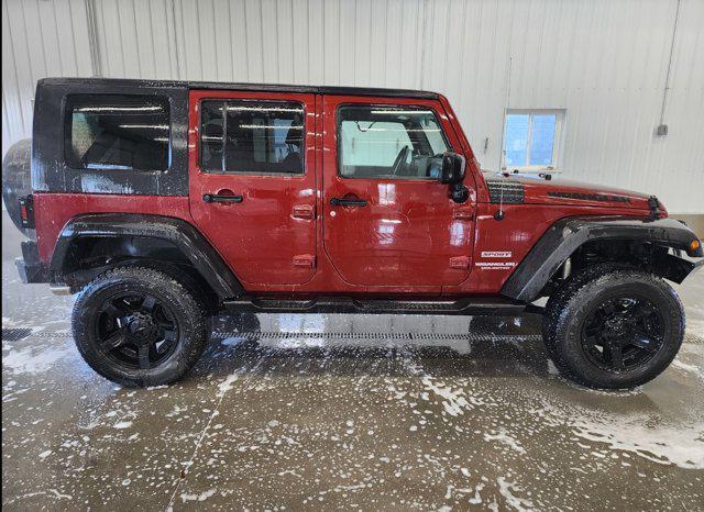 used 2010 Jeep Wrangler Unlimited car, priced at $15,500