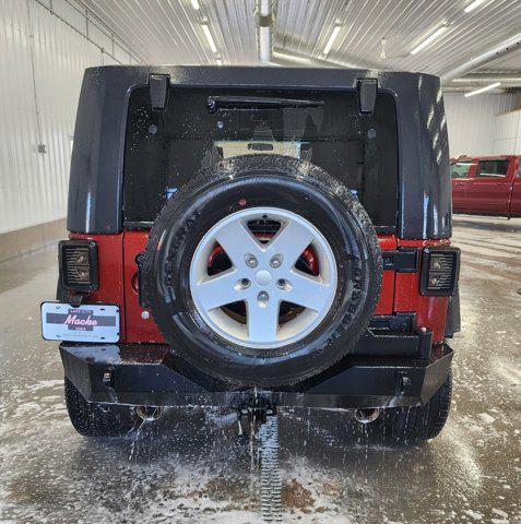 used 2010 Jeep Wrangler Unlimited car, priced at $15,500