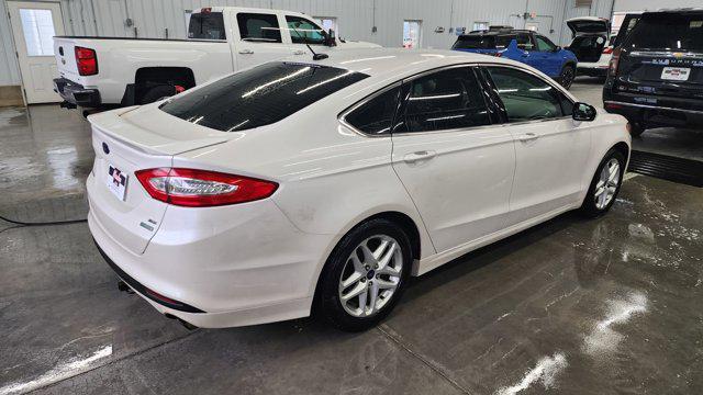 used 2014 Ford Fusion car, priced at $2,900