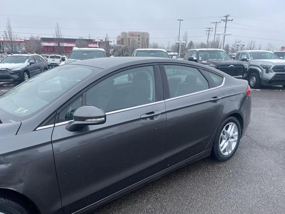 used 2016 Ford Fusion car, priced at $10,700