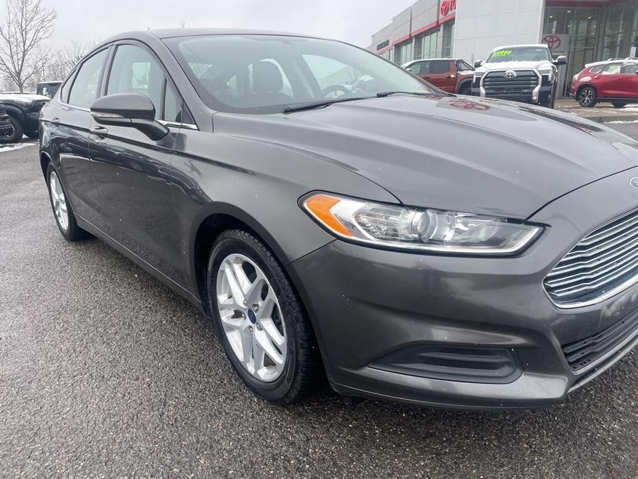 used 2016 Ford Fusion car, priced at $10,700