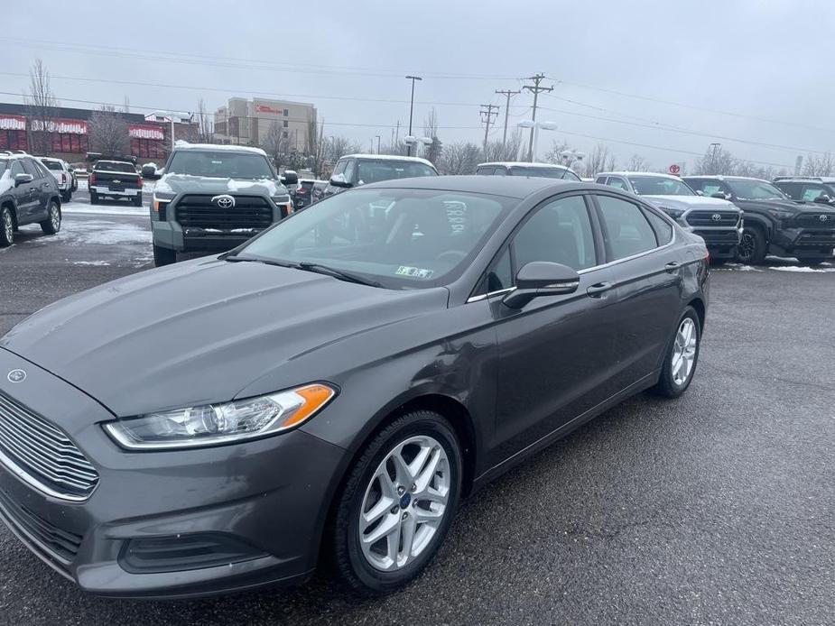 used 2016 Ford Fusion car, priced at $10,700