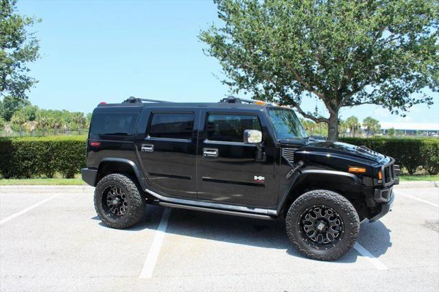 used 2003 Hummer H2 car, priced at $27,900