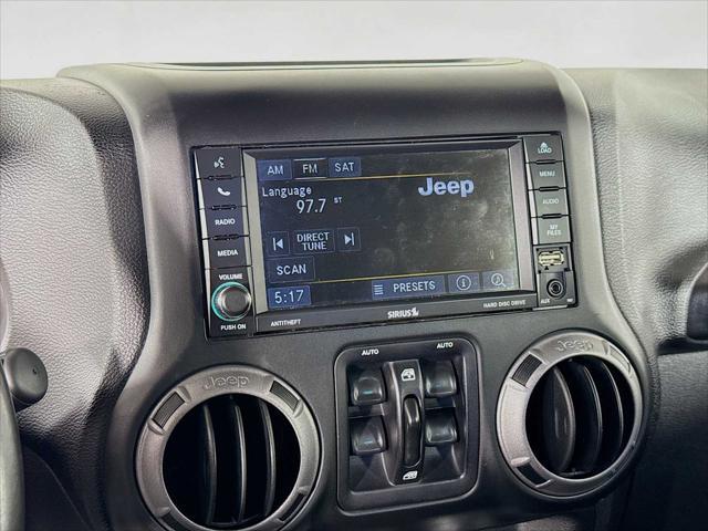 used 2014 Jeep Wrangler Unlimited car, priced at $19,998