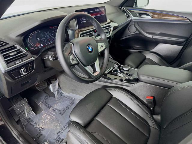 used 2025 BMW X4 car, priced at $58,998