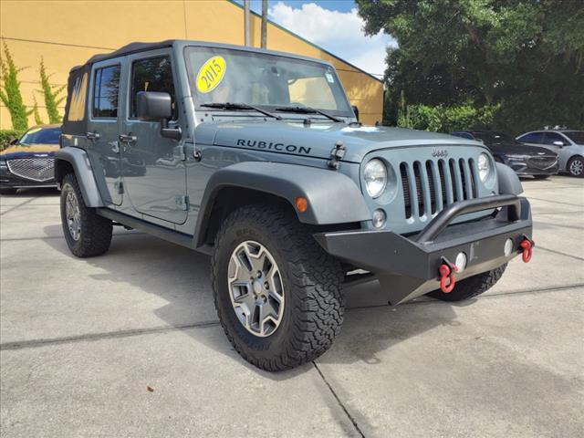 used 2015 Jeep Wrangler Unlimited car, priced at $23,971