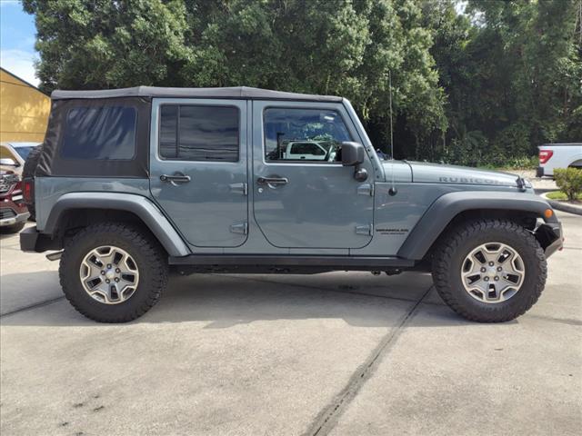 used 2015 Jeep Wrangler Unlimited car, priced at $23,971