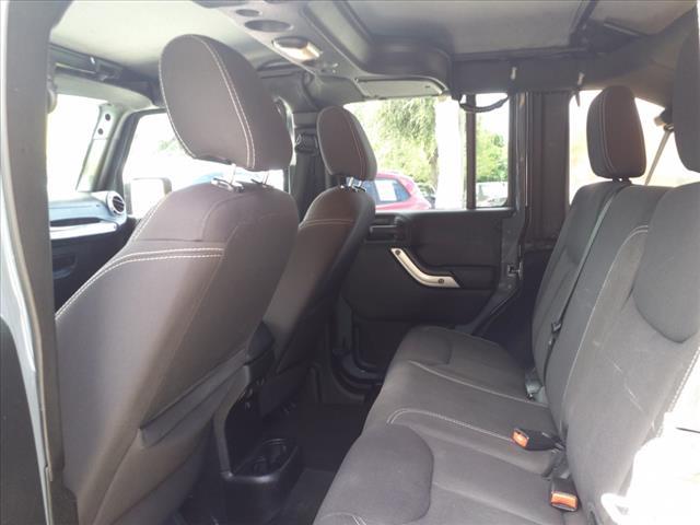 used 2015 Jeep Wrangler Unlimited car, priced at $23,971