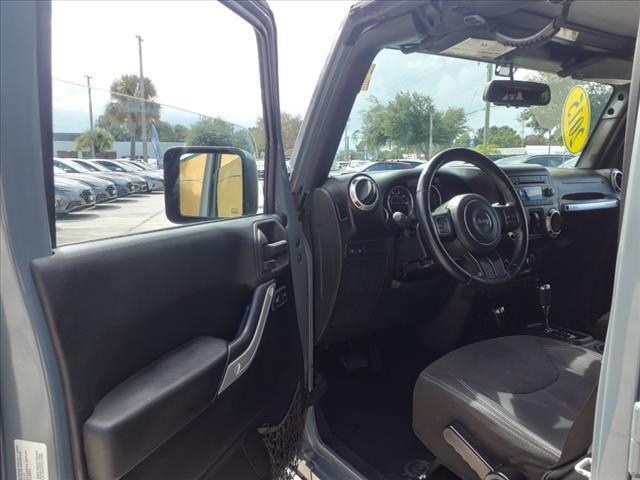 used 2015 Jeep Wrangler Unlimited car, priced at $23,971