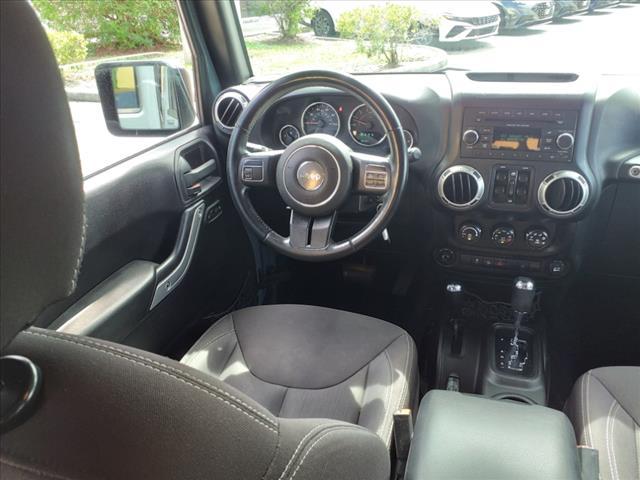 used 2015 Jeep Wrangler Unlimited car, priced at $23,971