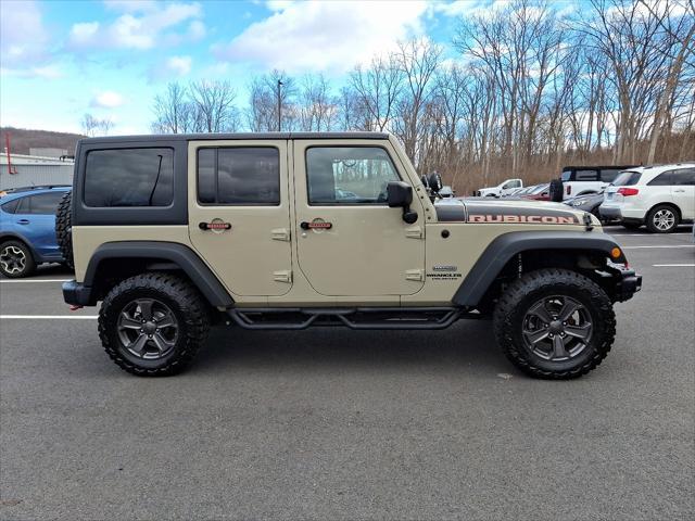 used 2017 Jeep Wrangler Unlimited car, priced at $29,656