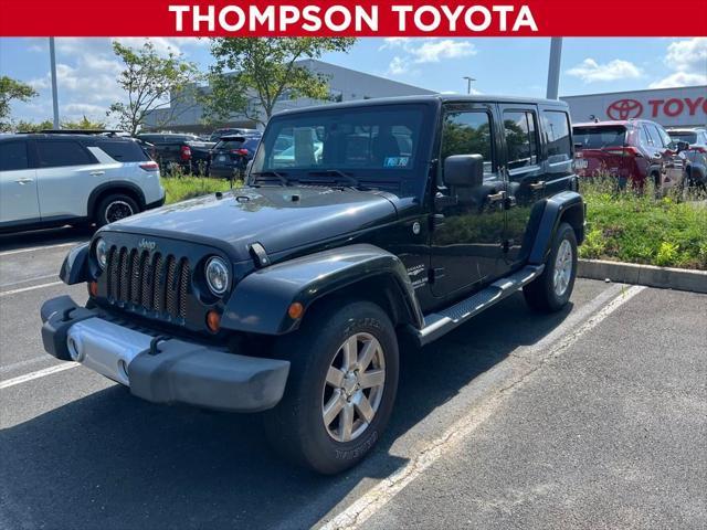 used 2013 Jeep Wrangler Unlimited car, priced at $14,990