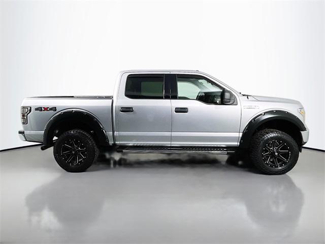 used 2018 Ford F-150 car, priced at $25,037