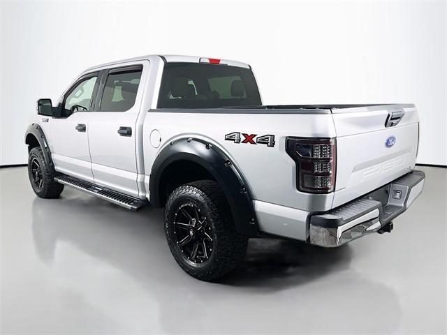 used 2018 Ford F-150 car, priced at $25,037