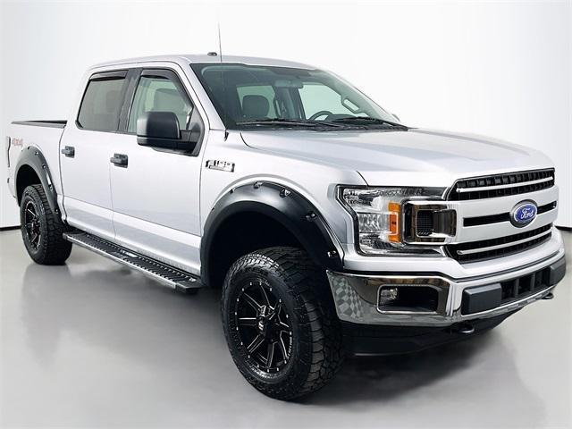 used 2018 Ford F-150 car, priced at $25,037