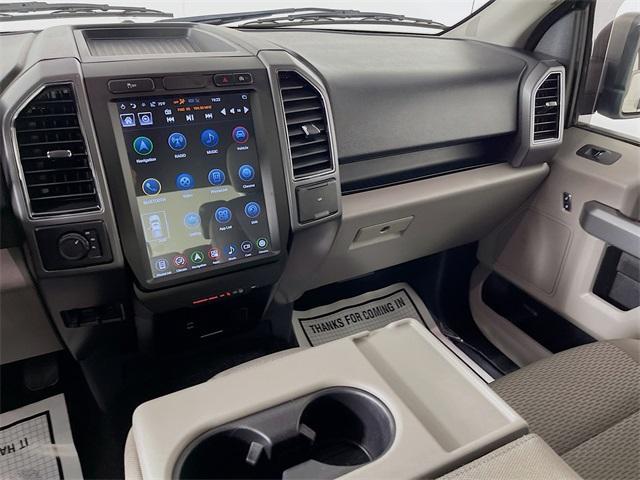 used 2018 Ford F-150 car, priced at $25,037