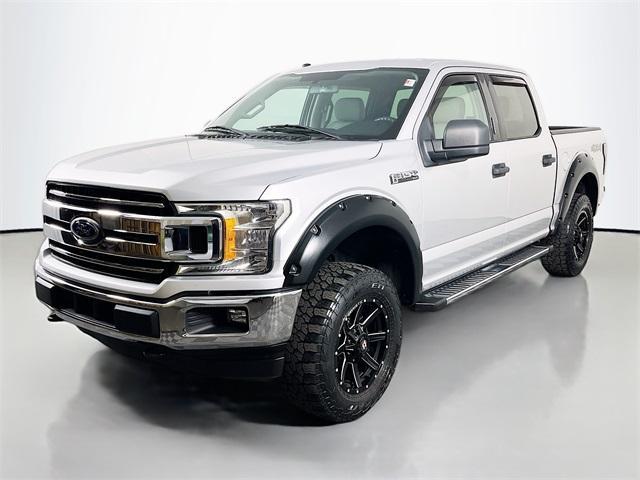 used 2018 Ford F-150 car, priced at $25,037
