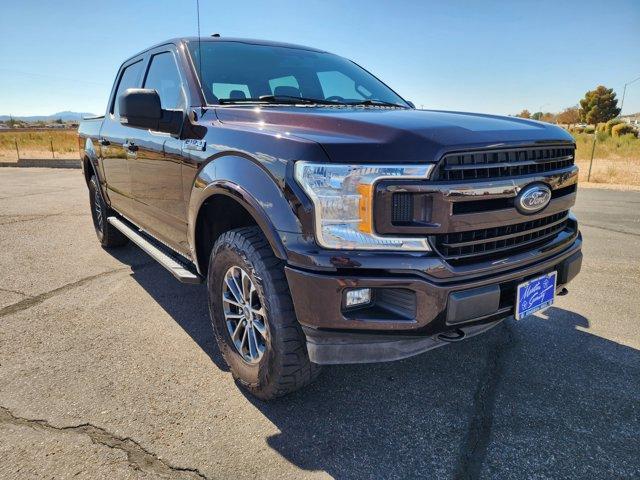 used 2018 Ford F-150 car, priced at $32,571