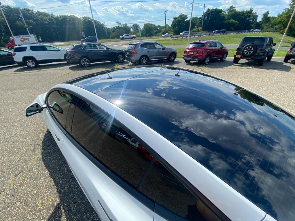 used 2021 Tesla Model 3 car, priced at $39,900