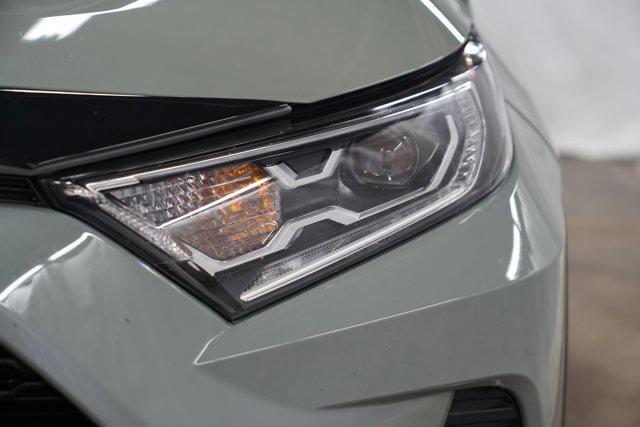 used 2021 Toyota RAV4 Hybrid car, priced at $30,000