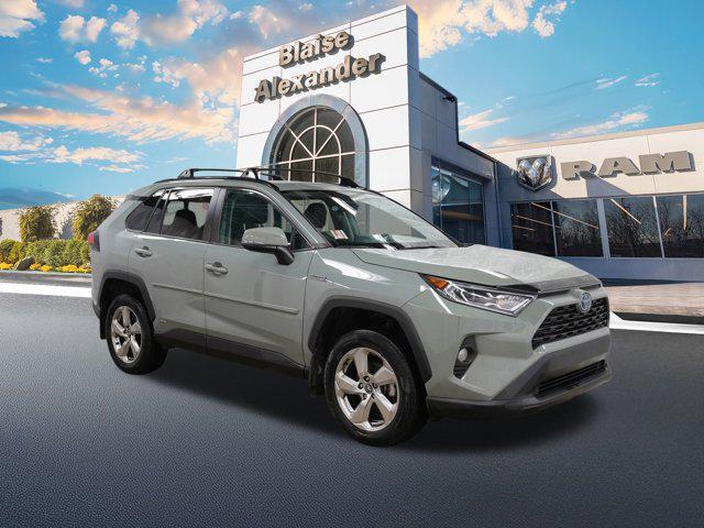 used 2021 Toyota RAV4 Hybrid car, priced at $30,000
