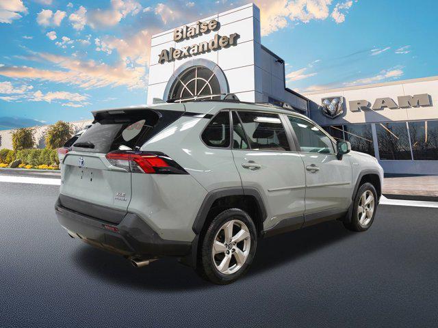 used 2021 Toyota RAV4 Hybrid car, priced at $30,000