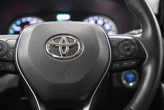 used 2021 Toyota RAV4 Hybrid car, priced at $30,000