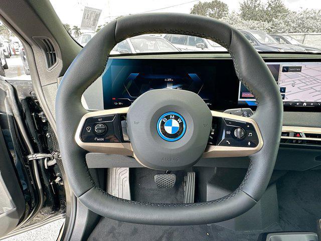 new 2025 BMW iX car, priced at $95,825