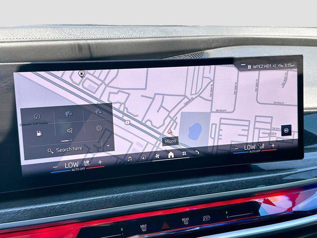 used 2024 BMW 750e car, priced at $76,700