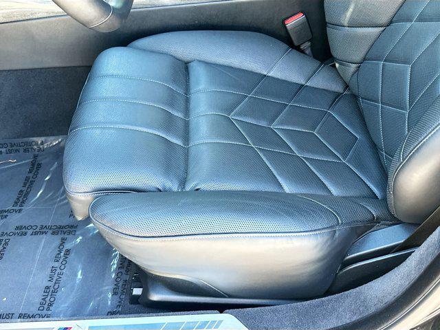 used 2024 BMW 750e car, priced at $76,700