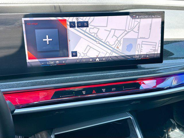 used 2024 BMW 750e car, priced at $76,700