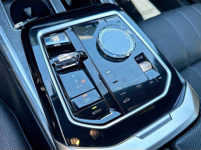 used 2024 BMW 750e car, priced at $76,700