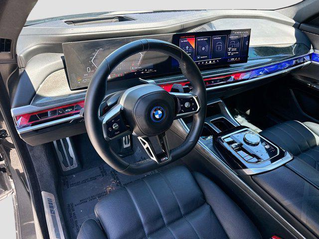 used 2024 BMW 750e car, priced at $76,700